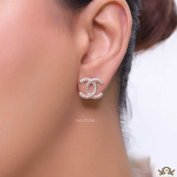 Rose gold plated twin C motif studs with cz