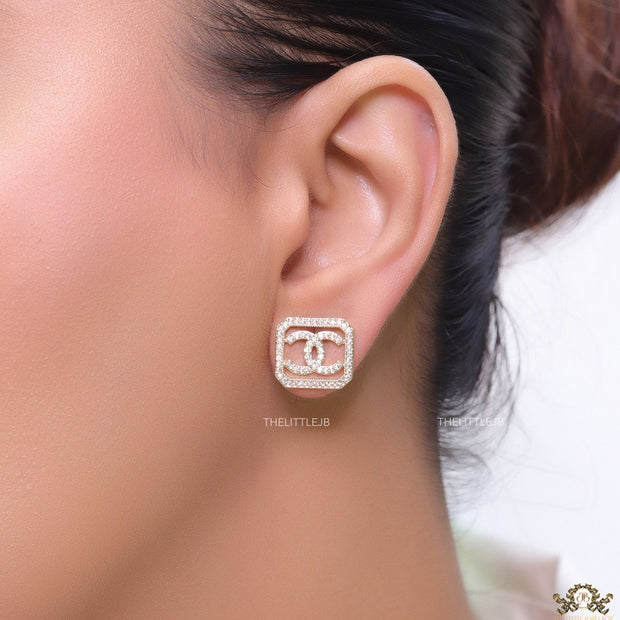 Gold plated square cz stud with twin C motif