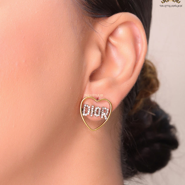 Matt gold plated heart shaped earrings with cz alphabets