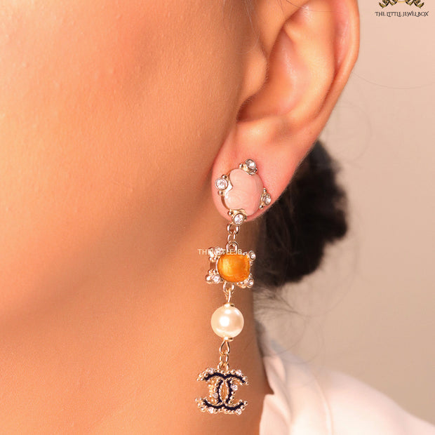 Double C dangles with pink, orange stones, pearls and cz