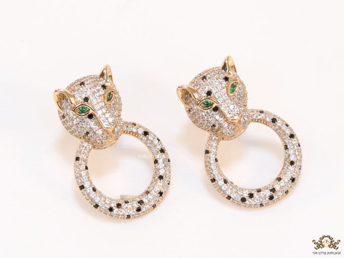 Cz panther face with ring studs in golden finish