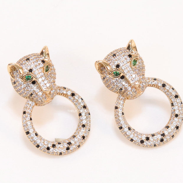 Cz panther face with ring studs in golden finish