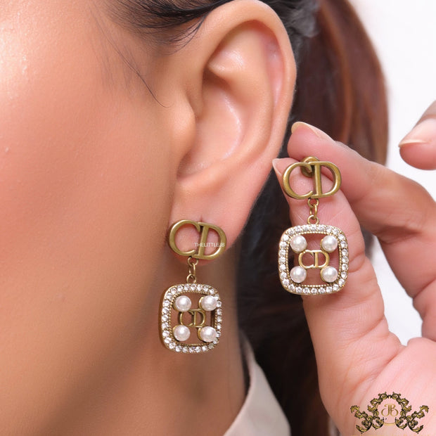 Antique gold plated alphabet motif studs with cubic zirconia stones, white pearl and alphabets