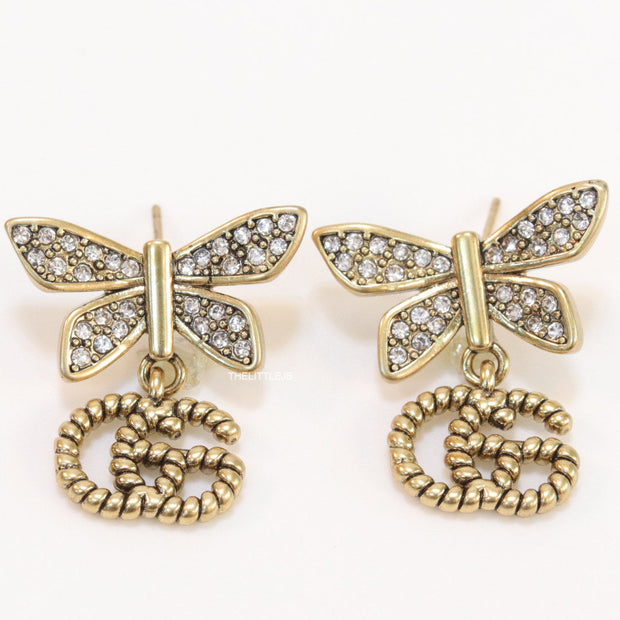 Studed cubic zirconia stone butterfly studs with textured double G motif drop