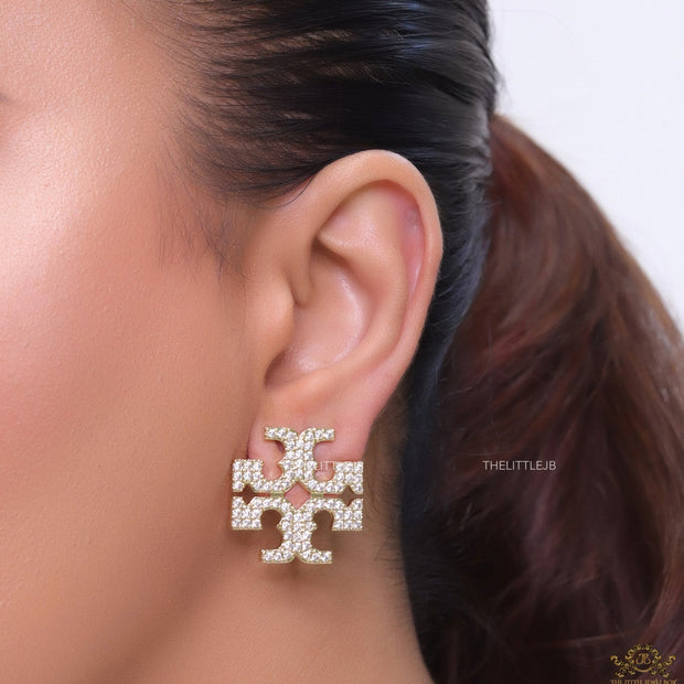 Gold plated twin T motif cz earrings
