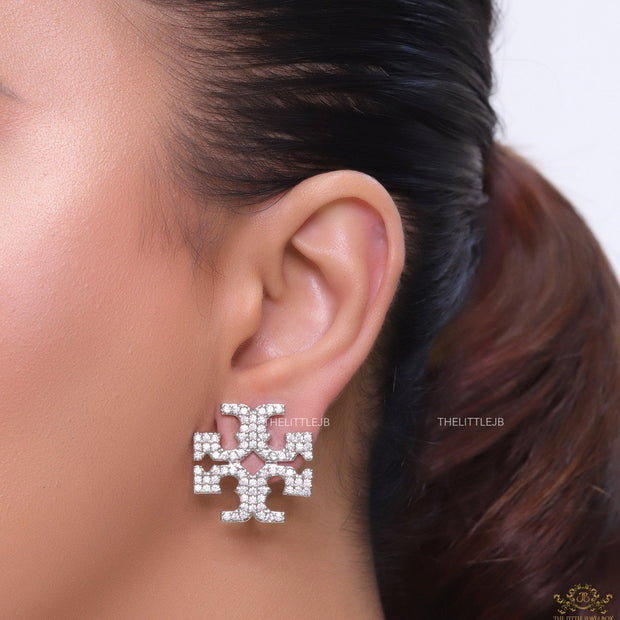 Platinum plated twin T motif cz earrings