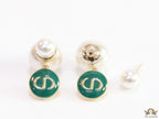 Golden pearl bomber earrings with green alphabet drop