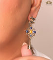 Gold plated key earrings with double C motif and clovers