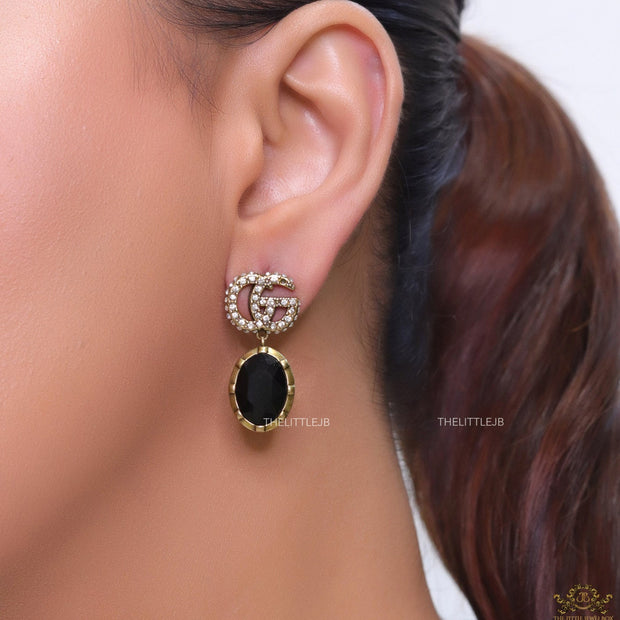 Rustic double G earings with oval black drop