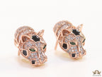 Asymmetrical cz and baguette panther studs in rose gold finish