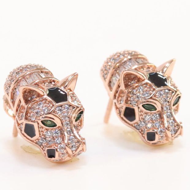 Asymmetrical cz and baguette panther studs in rose gold finish