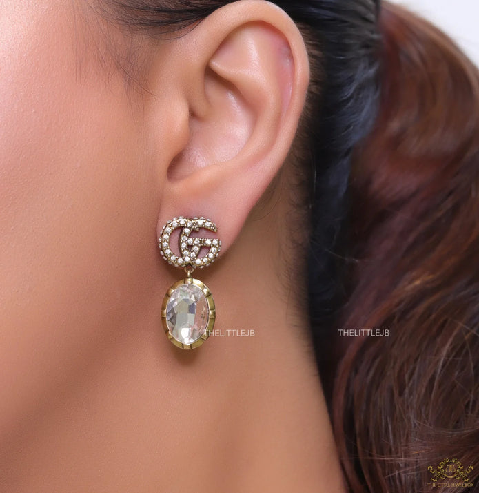 Rustic double G earrings with white drop