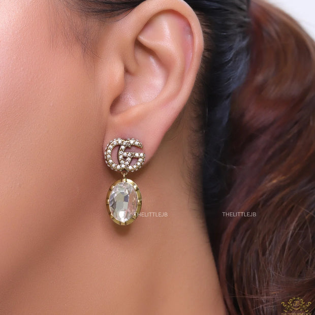 Rustic double G earrings with white drop