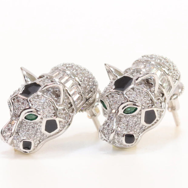 Asymmetrical cz and baguette panther studs in platinum finish