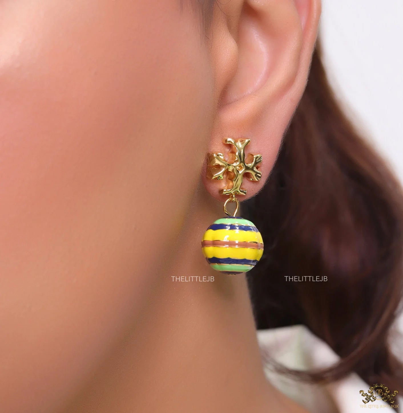 Enamel coated round drop earrings in gold plating