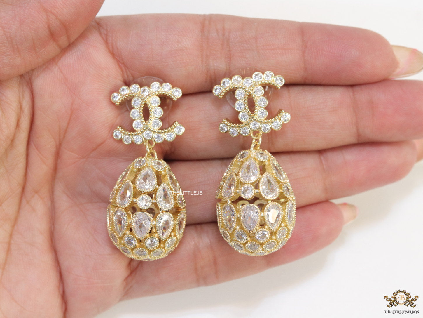 Golden twin C cz earrings with fancy cz lobe shape drops