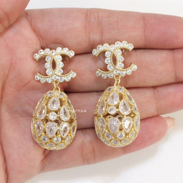 Golden twin C cz earrings with fancy cz lobe shape drops