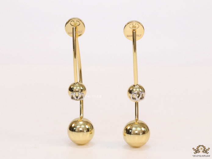 Open long twin lobed golden earrings
