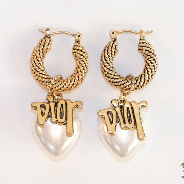 Golden hoops with alphabets and pearl drop