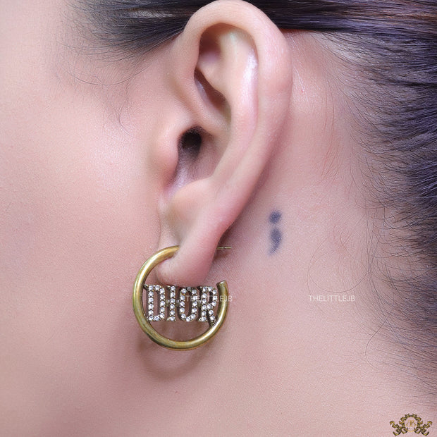 Open golden hoops with cz alphabets