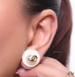 White acrylic studs with pearl and twin C motif