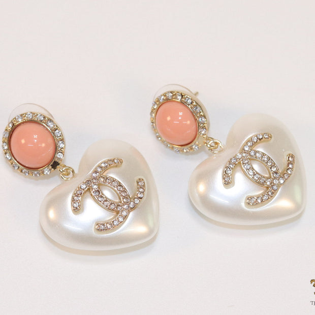 Heart shaped pearl and cz earrings with twin C motif