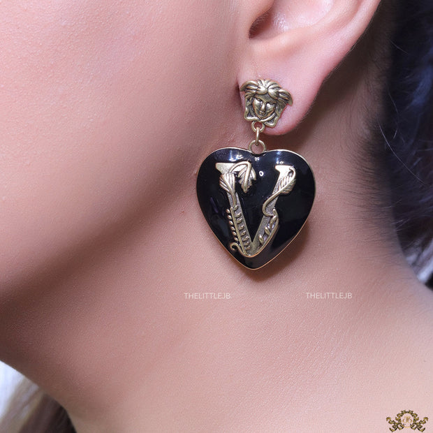 Gold plated medusa earrings with V motif black heart shape drop
