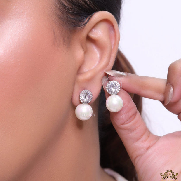 Platinum plated round cz earrings with pearl drop
