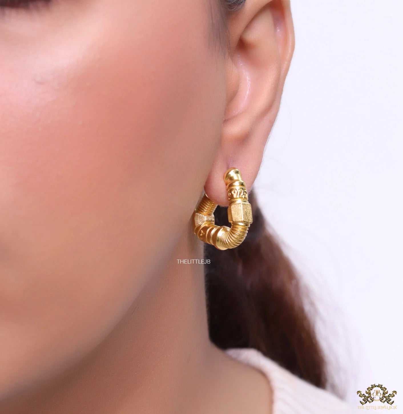 Alphabet BV Gold plated open bent bolt shape earrings