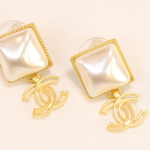 Gold plated Square MOP studs with double C motif