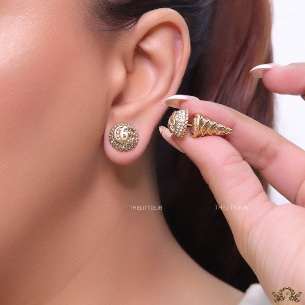 Gold plated cz softy shape studs with twin G motif