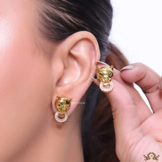Golden panther face studs with cz baguette ring