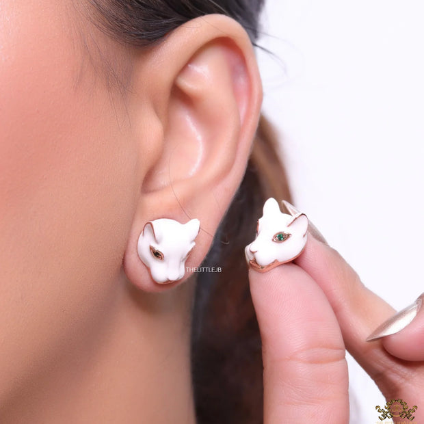 White and rose gold panther face studs