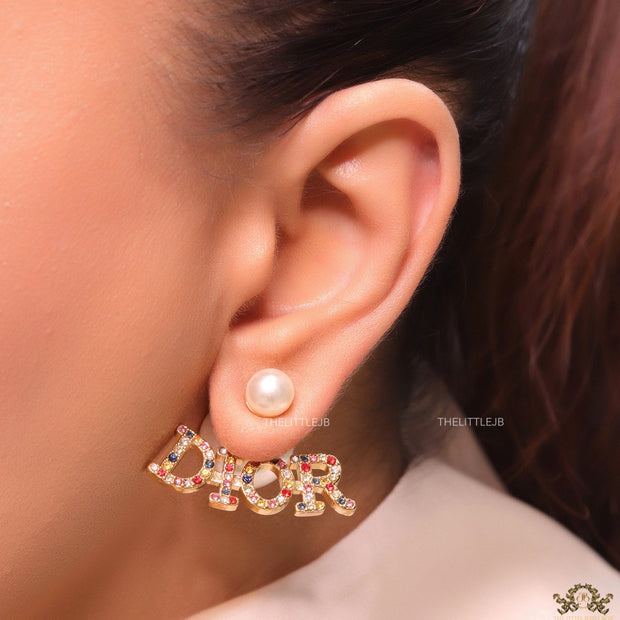 Pearl bomber earrings with golden and multi cz alphabet drop charms