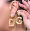 Gold plated alphabet D and G earrings with pearl tops