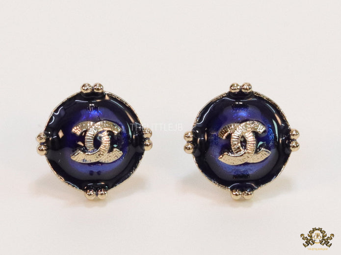 Royal blue studs with double C in centre