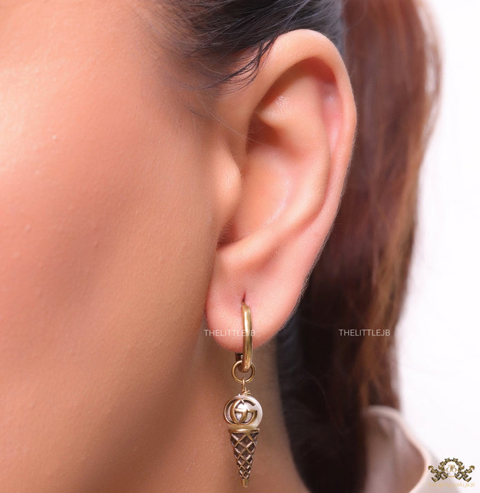 Small gold plated hoops with twin G and softy drops