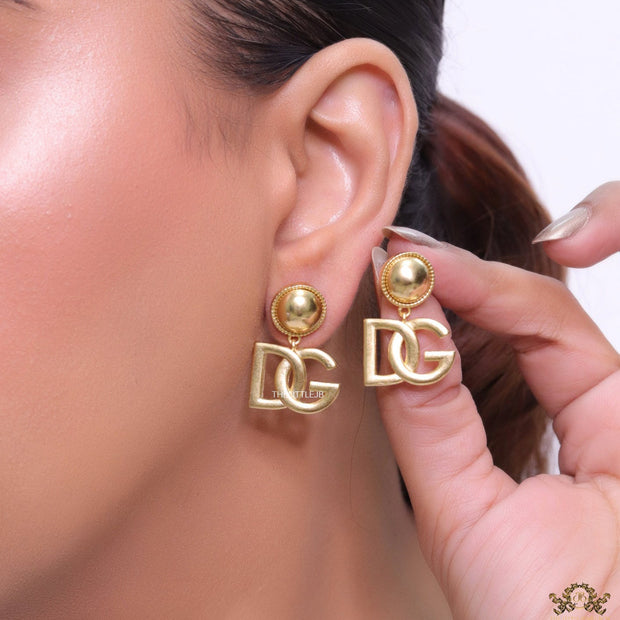 Golden alphabet drop earrings with golden pearl tops