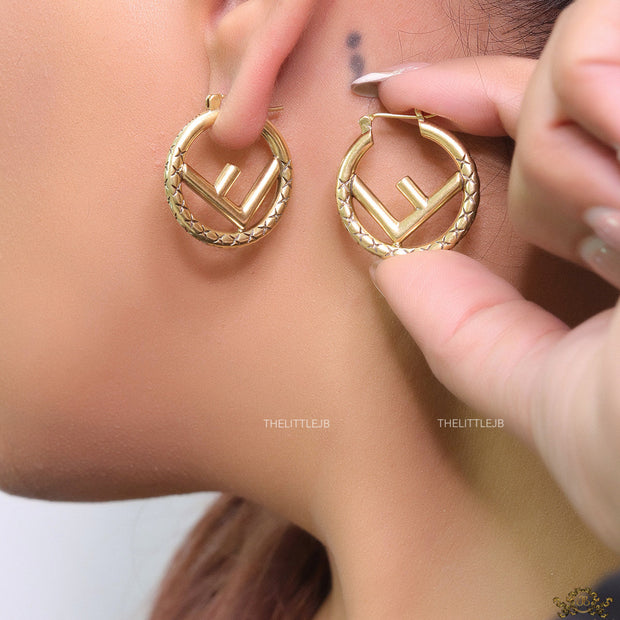 Designer golden hoops with alphabet motif
