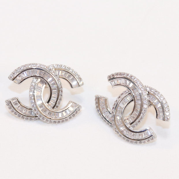 Platinum plated cz studs in twin C motif