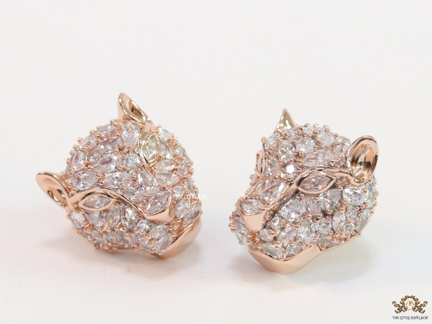 Panther head stud earrings in rose gold and cz