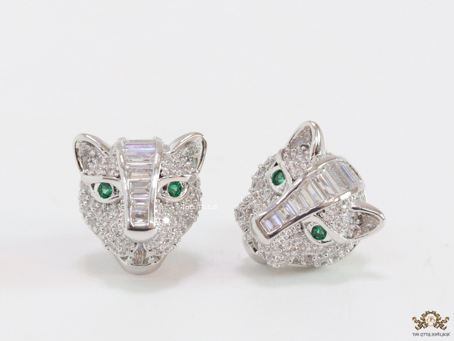 Cz panther stud earrings in platinum finish and emerald green eyes