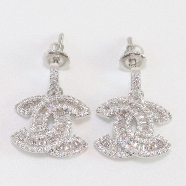 Platinum plated cz dangle earrings with twin C motif