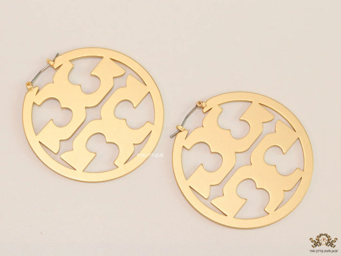 Matt Gold hoops with T motifs