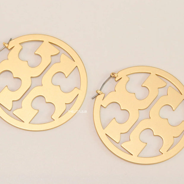 Matt Gold hoops with T motifs