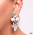 Cz flower earrings with shell pearls and light green stones