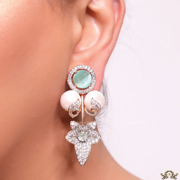 Cz flower earrings with shell pearls and light green stones