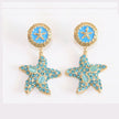 Aqua gold star dangles