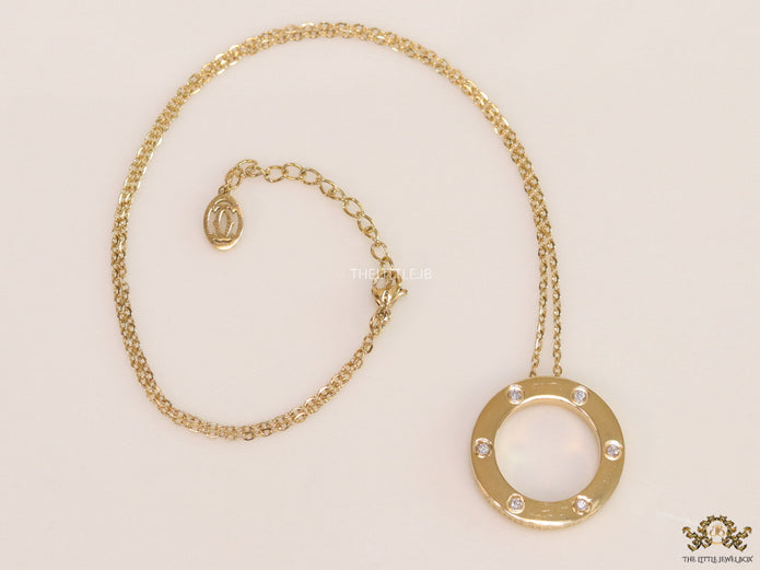 Gold plated disc shape pendant necklace with cz