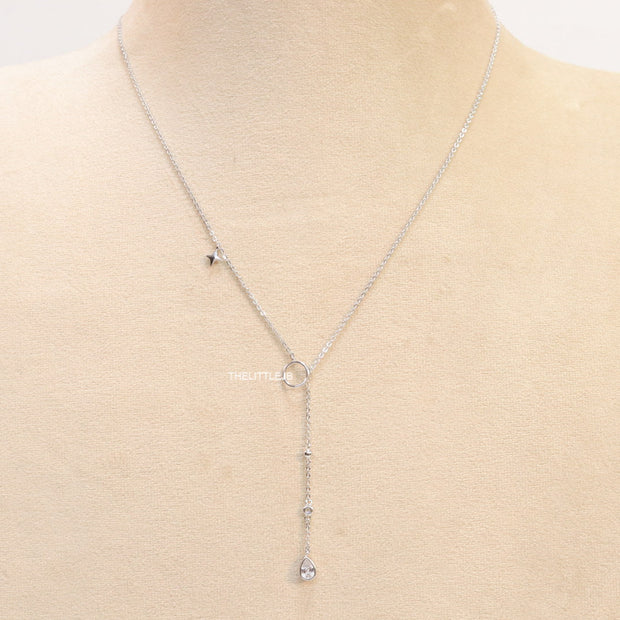 Platinum knot necklace with cz drop and small charms